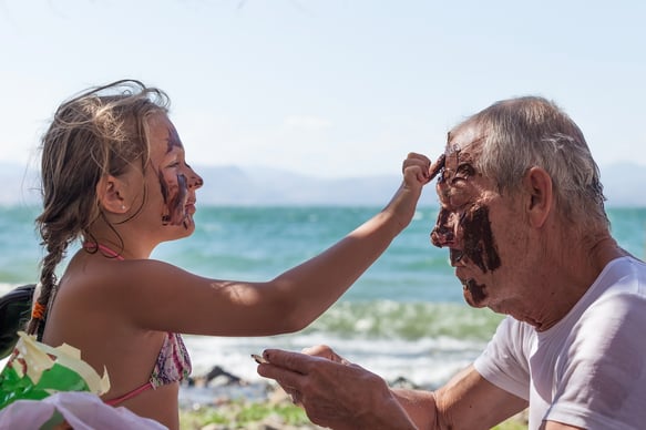 grandfather-and-granddaughter-on-beach.jpeg